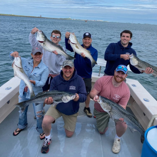 happily look of people who is holding fish